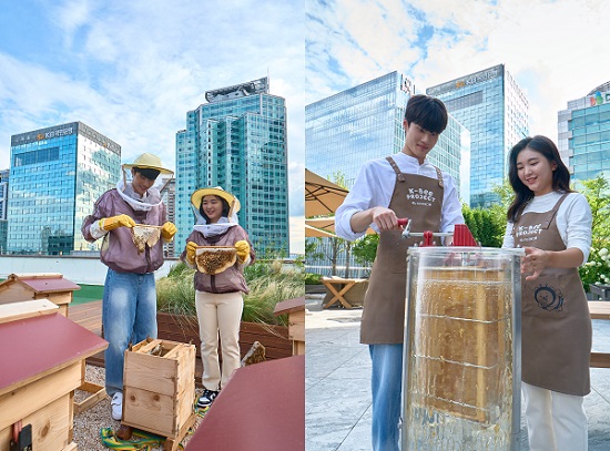 ▲ KB금융 황선우 선수와 이예원 선수가 KB국민은행 본점 옥상에 조성된 ‘K-Bee 도시양봉장’에서 올해 첫번째 꿀 수확 행사를 가졌다.