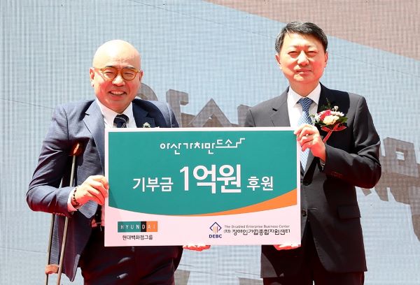 ▲장호진 현대지에프홀딩스 사장(오른쪽), 박마루 장애인기업종합지원센터 이사장