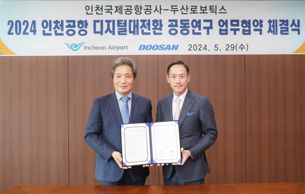 인천국제공항공사 이학재 사장(왼쪽), 두산로보틱스 박인원 대표